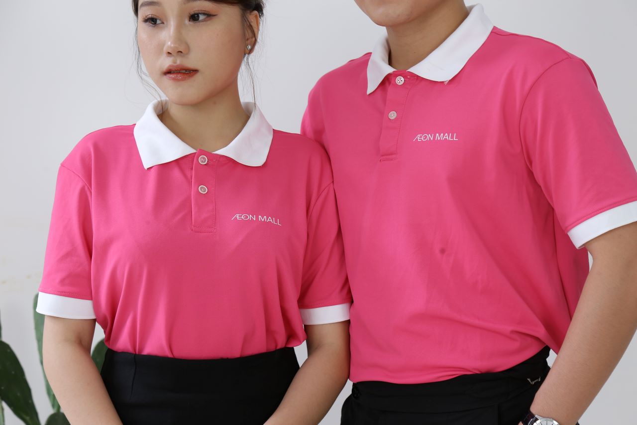 ĐỒNG PHỤC NHÂN VIÊN CÔNG TY AEON MALL THÊU 2 Mẫu áo đồng phục nhân viên màu hồng ấn tượng không kém phần tinh tế